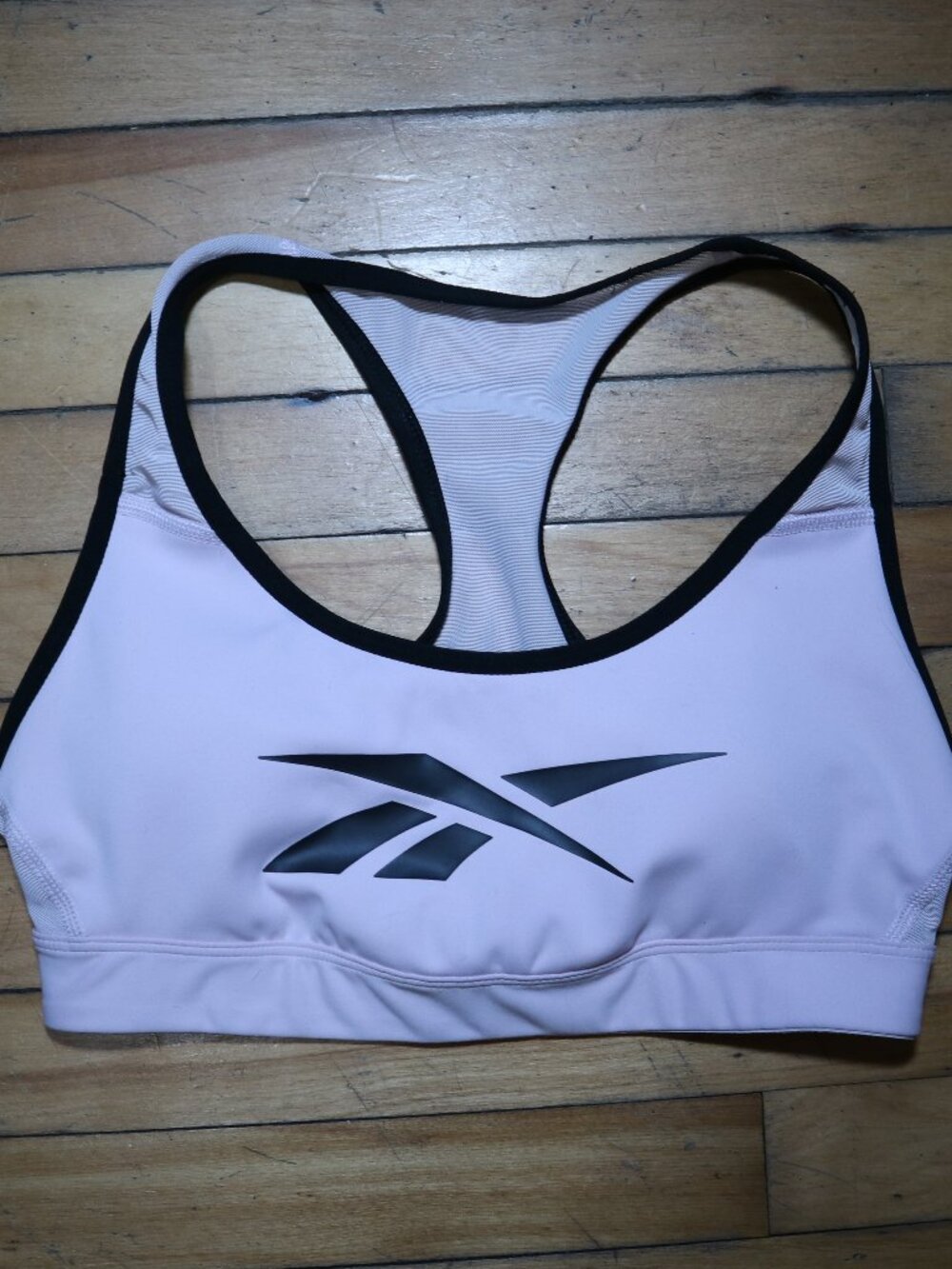 Reebok Light Pink Racerback Sports Bra with Black Logo Trim